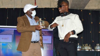 Konza Technopolis Development Authority (KoTDA) CEO Eng. John Tanui (left) with Flaqo Raz who won the Disruptor of the Year Award during the Africa Digital Influencers Awards (ADIA) 2020.The ceremony was held at Konza Technopolis