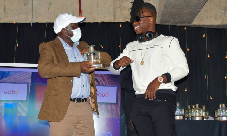 Konza Technopolis Development Authority (KoTDA) CEO Eng. John Tanui (left) with Flaqo Raz who won the Disruptor of the Year Award during the Africa Digital Influencers Awards (ADIA) 2020.The ceremony was held at Konza Technopolis