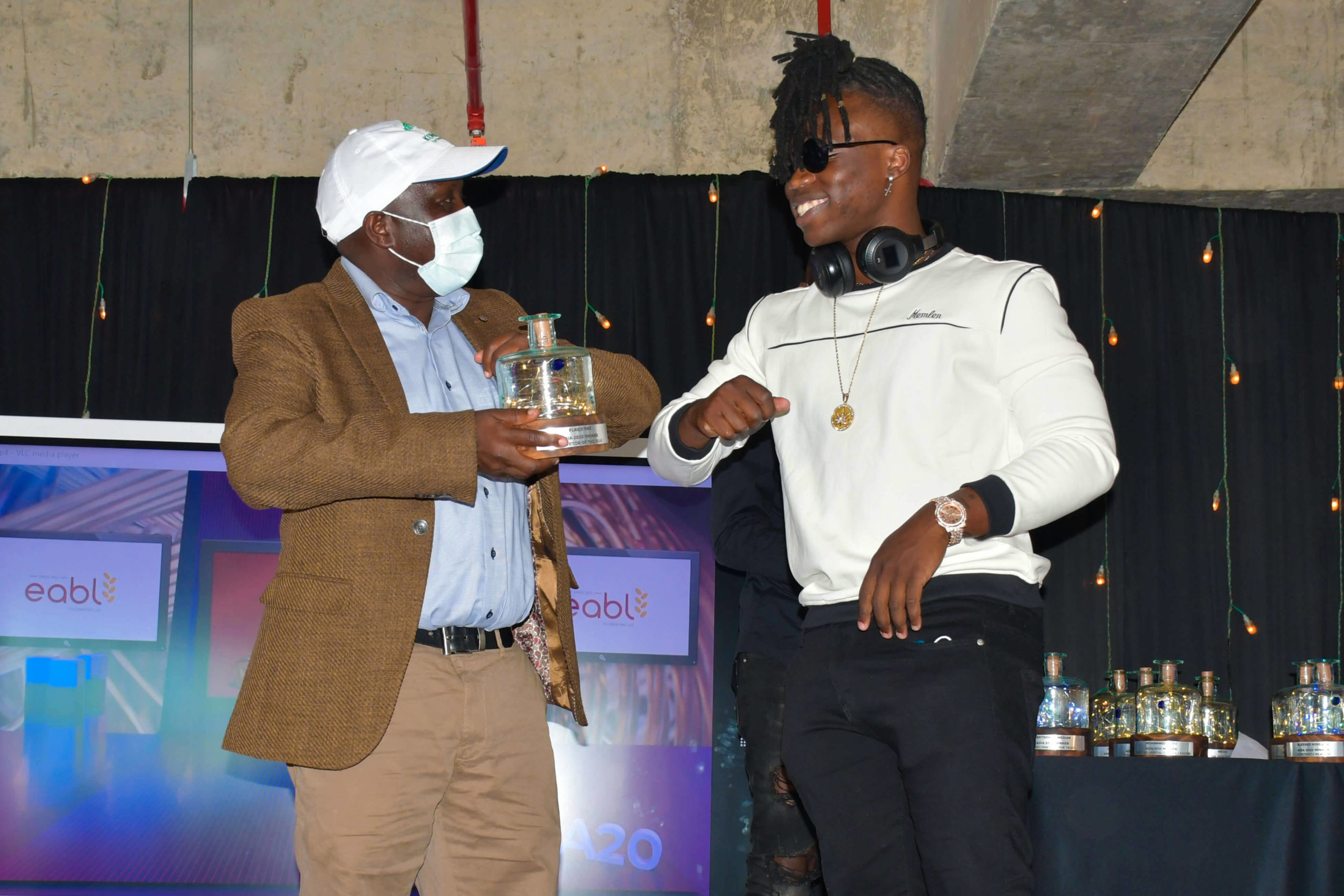 Konza Technopolis Development Authority (KoTDA) CEO Eng. John Tanui (left) with Flaqo Raz who won the Disruptor of the Year Award during the Africa Digital Influencers Awards (ADIA) 2020.The ceremony was held at Konza Technopolis