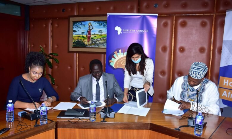 Triangle Real Estate Chief Executive Officer Amb. Arop Deng Kuol, and Shelter Afrique Chief Executive Officer Andrew Chimphondah sign the USD1.5bn housing deal in Nairobi witnessed by Benchmark Solutions Managing Director Laura Akunga and Shelter afrique's head of legal Houda Boudlali.