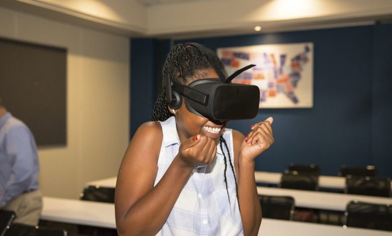 Black woman experiencing VR, South