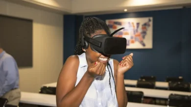 Black woman experiencing VR, South
