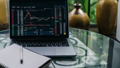 How to Choose The Platform to Trade Online cryptocurrency chart displayed on a laptop