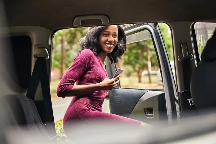 Uber partners with Safaricom to offer M-Pesa payments for rides and driver earnings in Kenya, promoting financial inclusion.