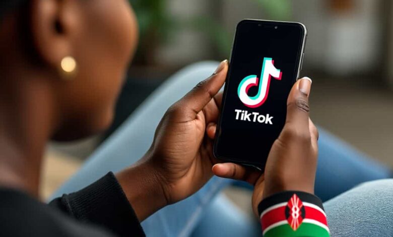 Person holding a smartphone, ready to navigate TikTok promotion features, symbolizing the new advertising opportunities available in Kenya