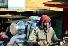 man transporting containers on motorcycle New toolkit aims to reform Kenya’s gig economy, enhancing worker protections, industry standards, and investment, advancing Vision 2030’s digital goals.