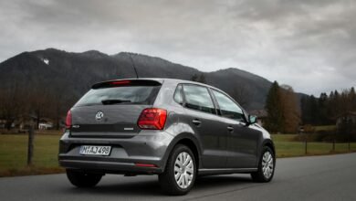 Volkswagen resumes car production in Kenya, aiming to establish a regional hub, focus on sustainability, electric vehicles, and industrial growth. gray car on gray asphalt road
