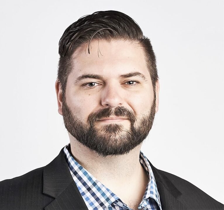 AI enhances cybersecurity but also empowers cybercriminals; careful, transparent, and human-first adoption is essential to avoid unintended security risks. 