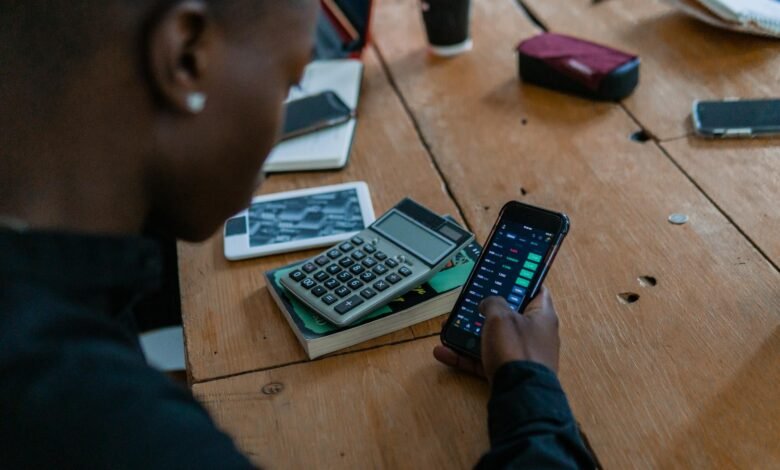 The Silicon Savannah’s Blind Spot: Building Data Centers on Broken Privacy close up shot of a person using a cellphone