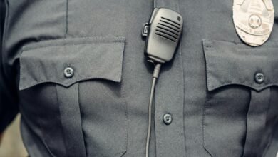 person in police uniform with body cam