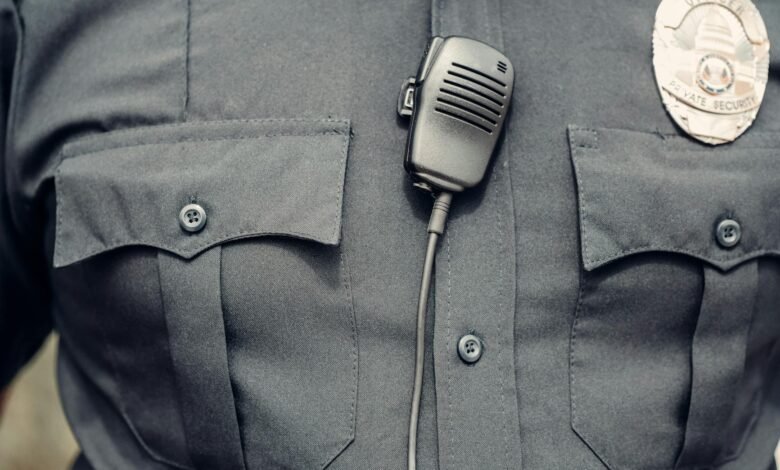 person in police uniform with body cam