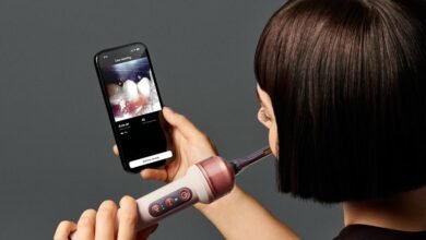 Dyson's CameraJet toothbrush has a 0.1-megapixel camera that finds gaps between teeth and jets mouthrinse into them for USD 499.